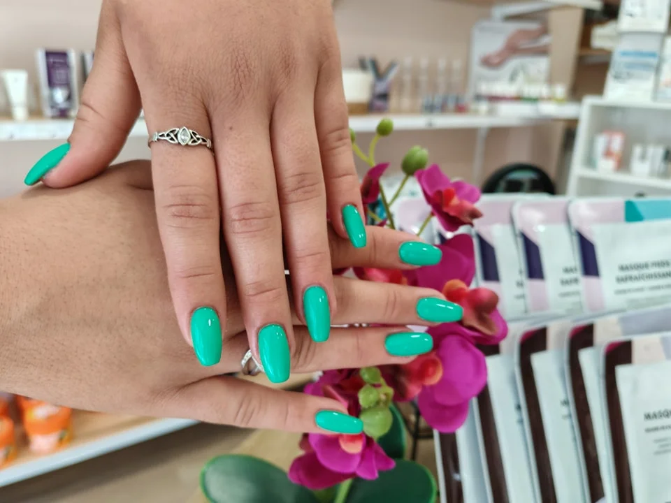 woman-getting-her-manicure-done-at-the-salon